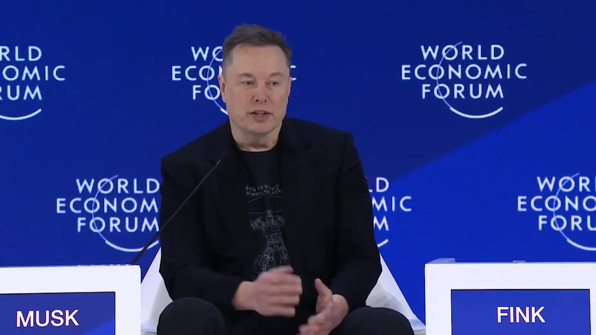 Abundance or Agony? Elon Musk Maps Out the Optimus Production S-Curve in Davos